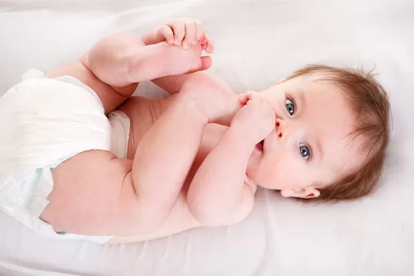 Cute baby in diaper — Stock Photo, Image