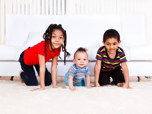Three kids crawling — Stock Photo, Image