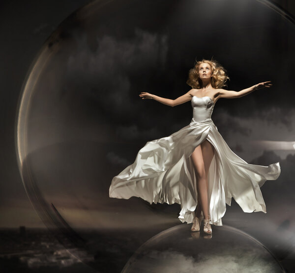 Stunning blonde wearing gorgeous dress