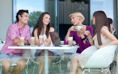 Young enjoying coffee break clipart