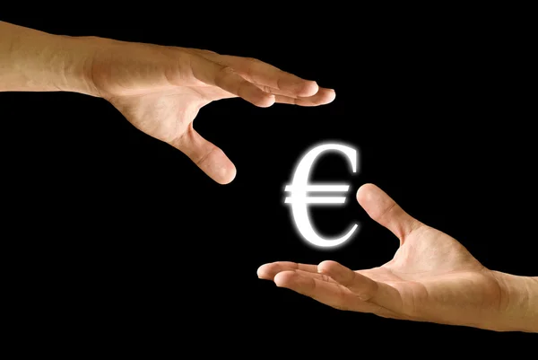 Χέρι του πωλητή να το εικονίδιο ευρώ από το χέρι του αγοραστή — Φωτογραφία Αρχείου
