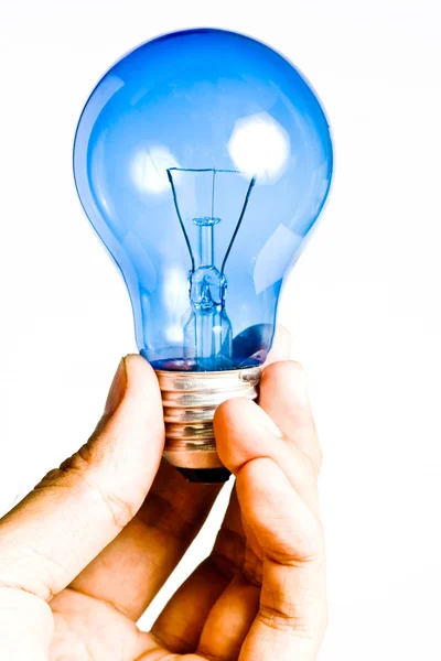 Blue light bulb in hand, Isolated — Stock Photo, Image