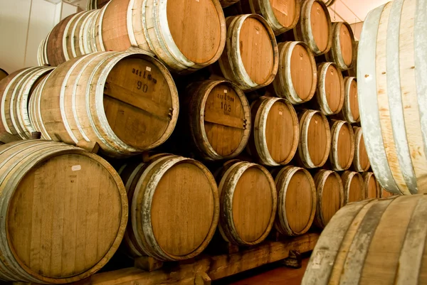 stock image Barrel aging the wine in wine factory