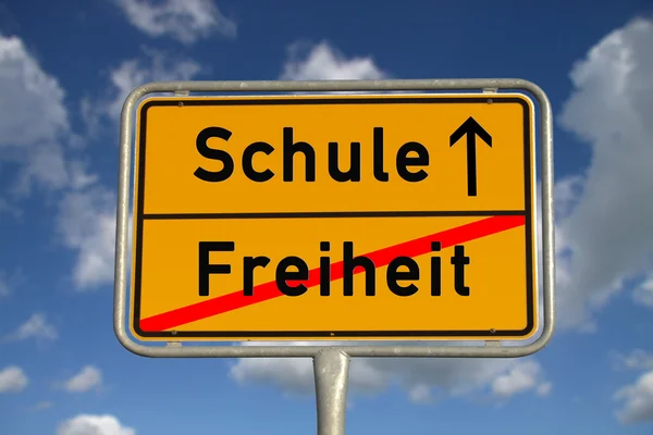 German road sign freedom and school — Stock Photo, Image