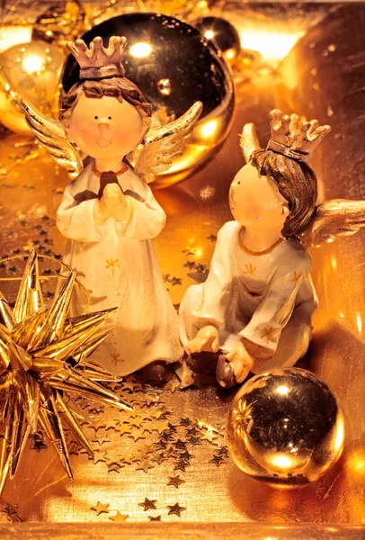 Bowl with golden Christmas decoration — Stock Photo, Image