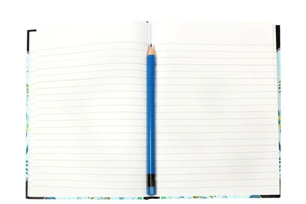 Single blue pencil in the centre of book — Stock Photo, Image