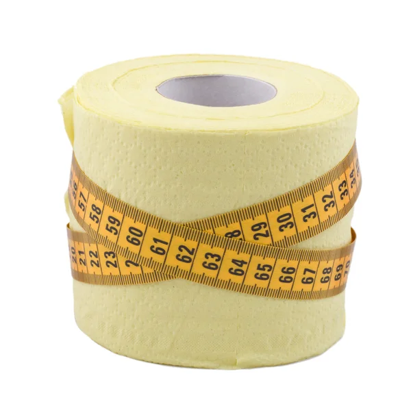 Centímetro e papel higiénico — Fotografia de Stock