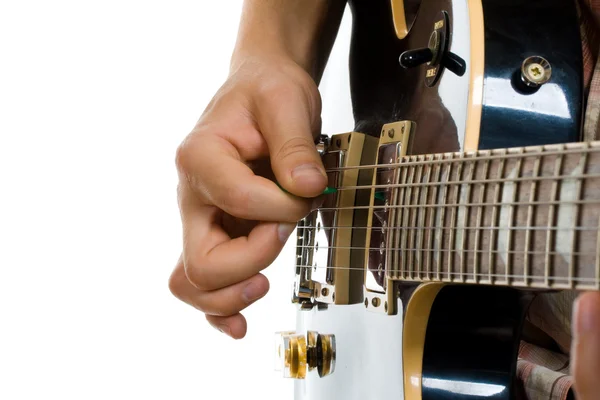 Как держать выбор гитары — стоковое фото