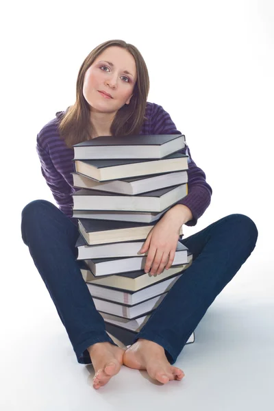 Femme avec pile de livres — Photo