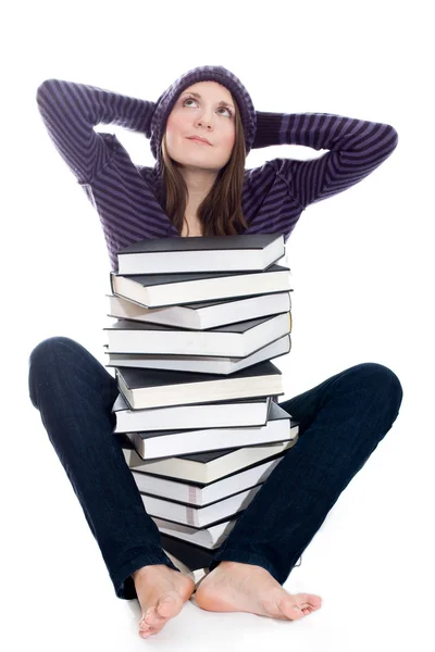 Satisfied woman with stack of books — Stock Photo, Image