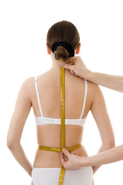 Misurare la schiena della donna — Foto Stock