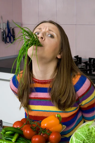Woman fed up from vegetables — Stock Photo, Image