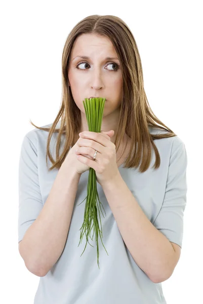 Woried woman with onion — Stock Photo, Image