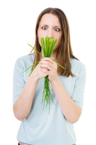 Triest vrouw met groen gras — Stockfoto
