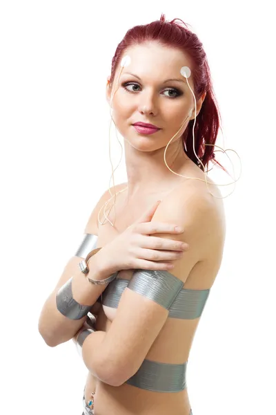 Positieve vrouw met medische sensoren op haar gezicht — Stockfoto