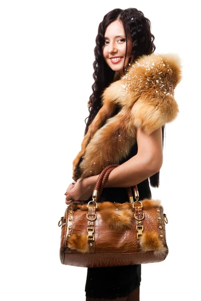 Woman stand with fur and bag — Stock Photo, Image