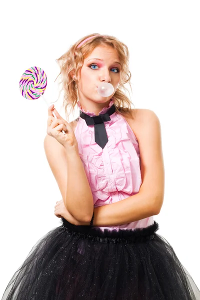 Woman blow up gum and hold candy — Stock Photo, Image