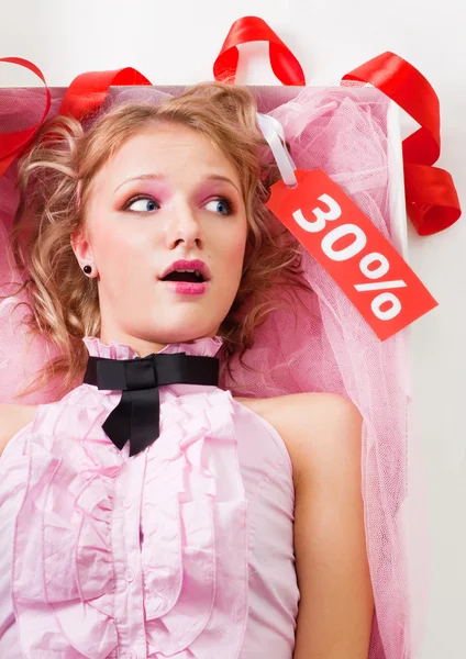 Fancy doll with sale tag — Stock Photo, Image