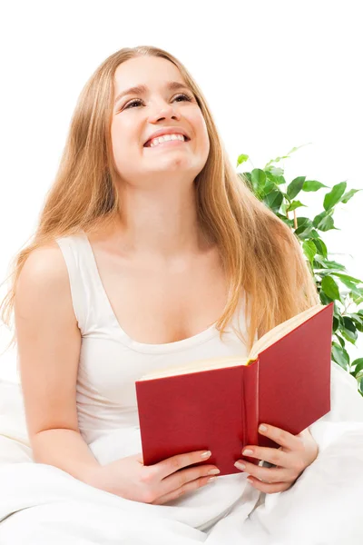 Woman read book sitting in bed — Stock Photo, Image