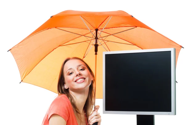 Girl an computer under umbrella — Stock Photo, Image
