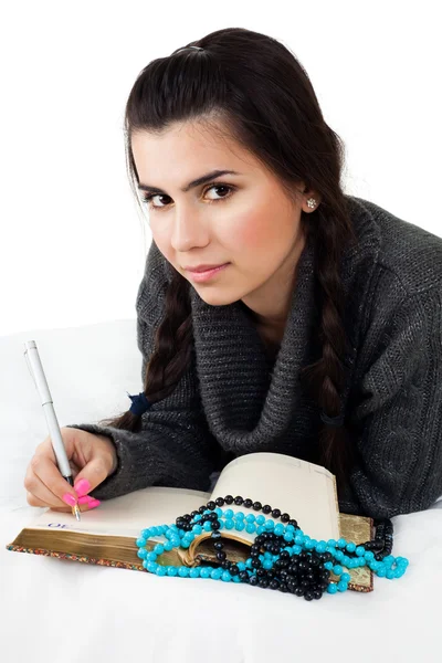 Chica con notas de escritura — Foto de Stock