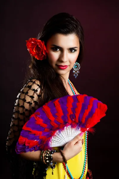 Beautiful gypsy woman with fan — Stock Photo, Image