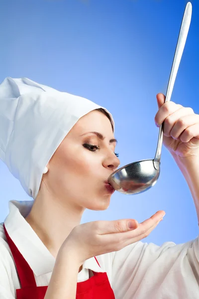 Chef tasting soup from ladle — Stock Photo, Image