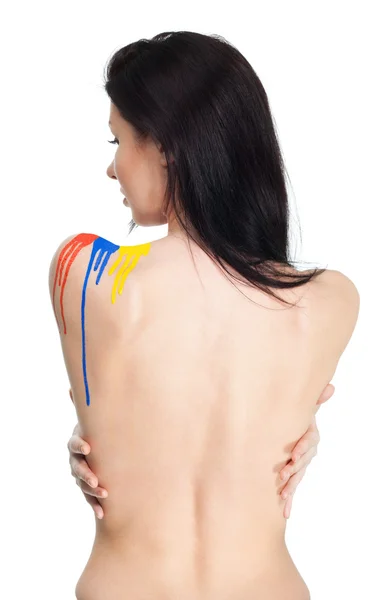 Espalda de mujer con pintura — Foto de Stock
