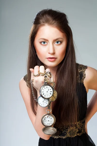 Žena s hodinkami — Stock fotografie