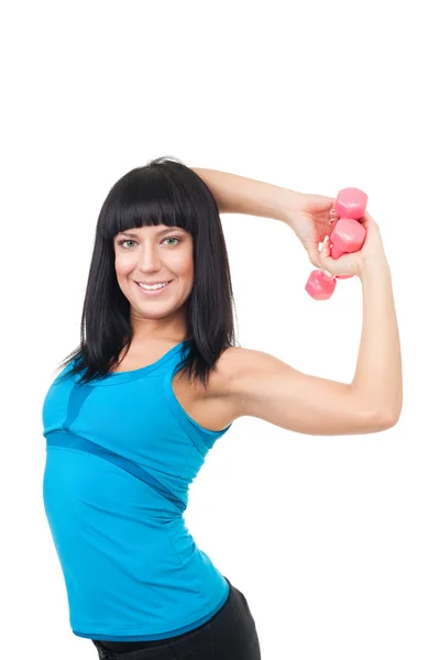 Mujer sonrisa y ejercicio con mancuernas — Foto de Stock