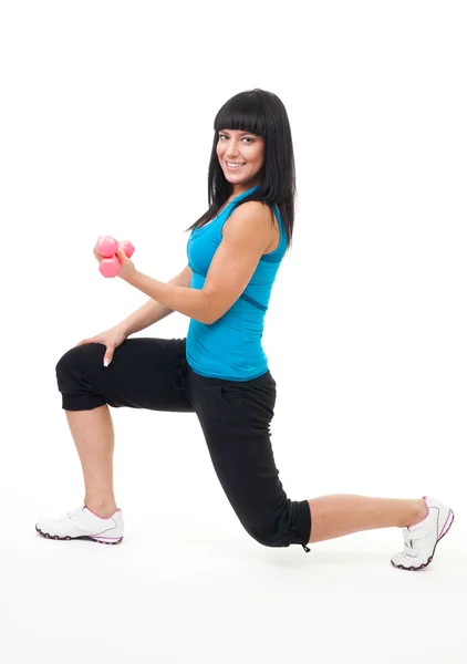 Donna fare fitness stand con manubri — Foto Stock