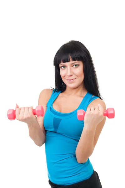 Happy young woman with dumbbells — Stock Photo, Image