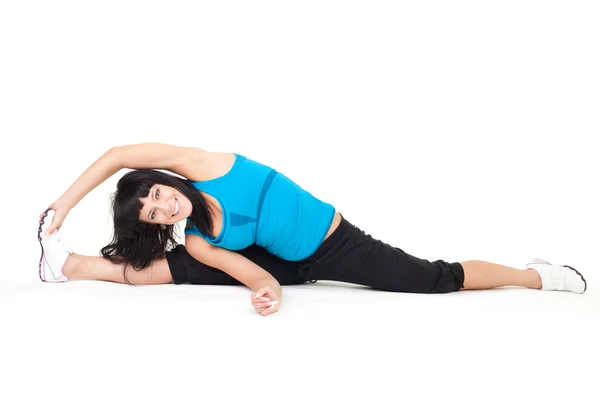 Body stretching sitting on splits — Stock Photo, Image