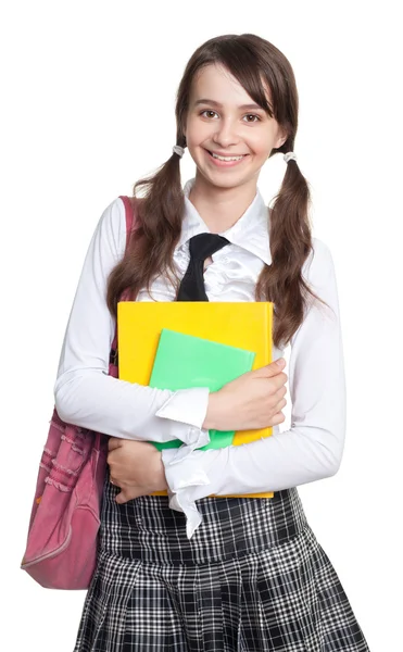 Schoolmeisje met boeken, rugzak en extensie — Stockfoto