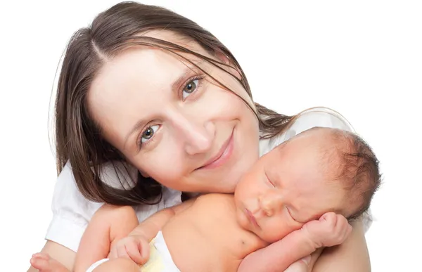 Mãe sorriso segurando seu bebê — Fotografia de Stock