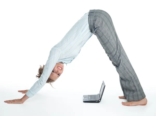 stock image Flexible businesswoman with laptop