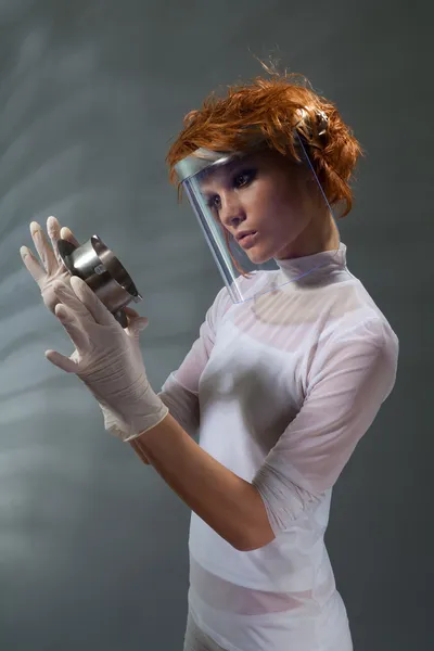 Scientist woman examine metal part concept — Stock Photo, Image