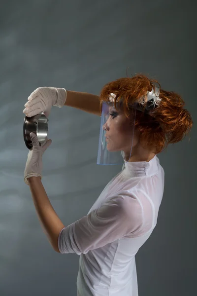 Laboratory woman examining detail — Stock Photo, Image