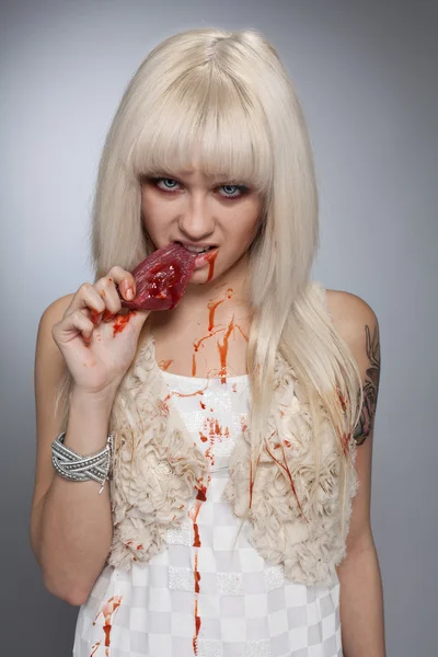Savage anti vegetarian girl — Stock Photo, Image
