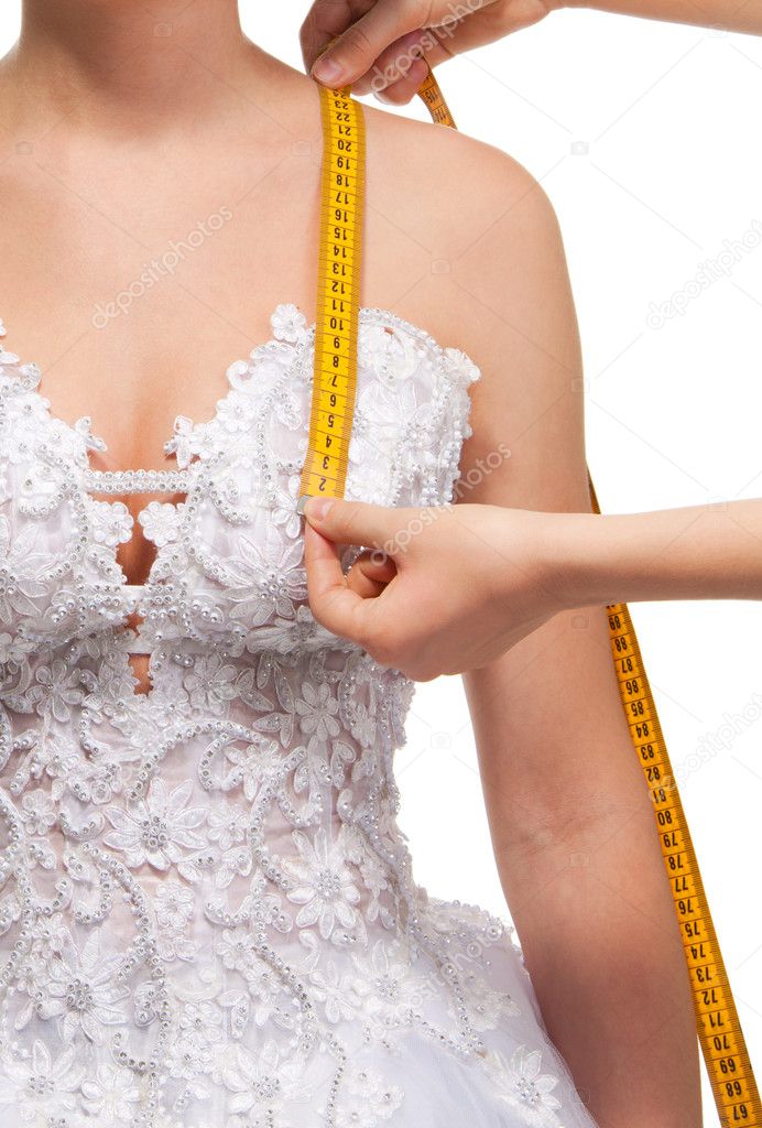 Measuring the distance from shoulder to breast