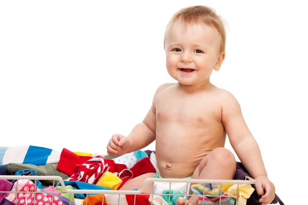 Lachendes Baby mit Kleidung — Stockfoto