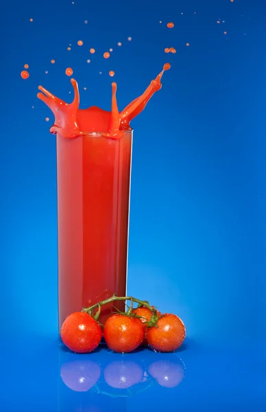 Splash of tomato juice — Stock Photo, Image