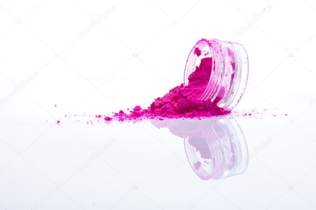 Spilled pink makeup powder