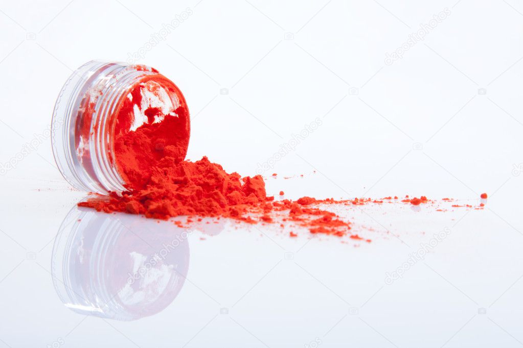 Spilled red makeup powder
