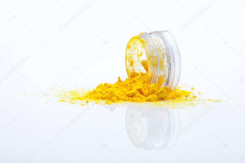 Spilled yellow makeup powder