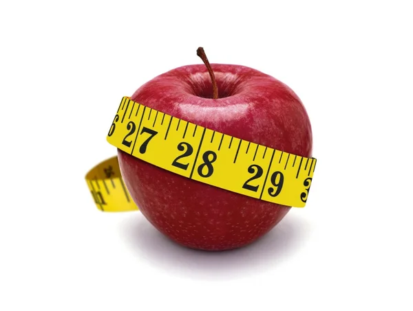 Červené jablko a měření páska — Stock fotografie