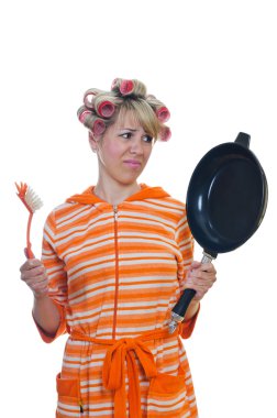 Housewife with a brush and pan clipart