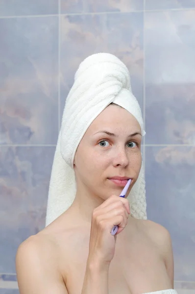 Donna con uno spazzolino da denti — Foto Stock