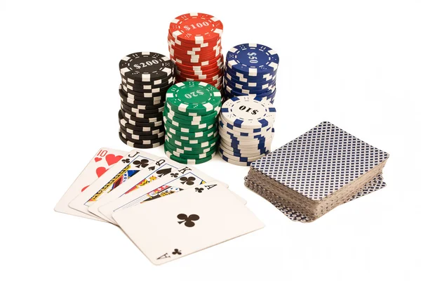 Bunch of casino chips, deck of cards and poker straight. — Stock Photo, Image
