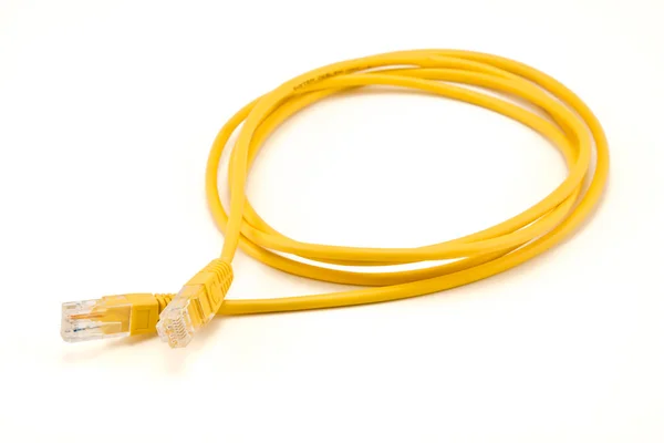 Gul Ethernet-kabel. Stockbild